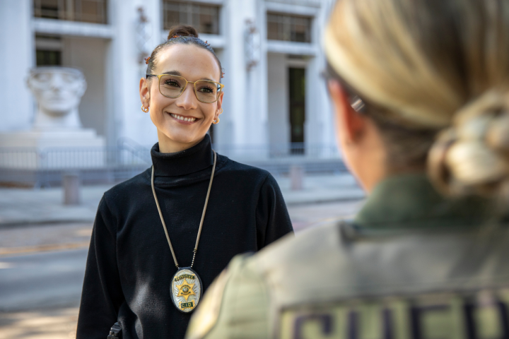 Graduate of the criminal justice degree program works as a detective, collaborating with the local sheriff. 